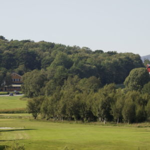 Austrått golf course, a view towards the culture house and Austrått agrotourism