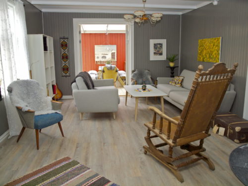 Holiday house, Austrått agrotourism, Kårstua, living room, colours in dark grey and white, furniture in light grey and brown